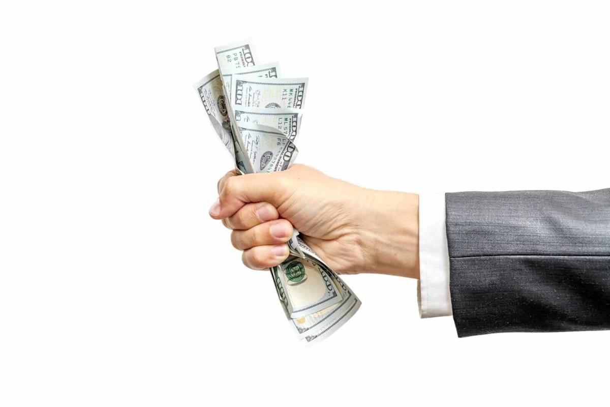 Dollar Gains on Weak Stocks and Hawkish Fed